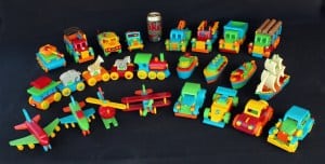 View of painted wood vehicles from the Plump'N'Tuff wood set