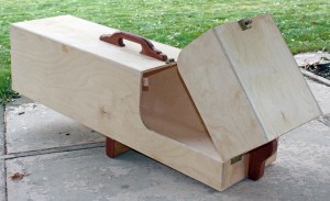 Wood animal trap in open (armed) position