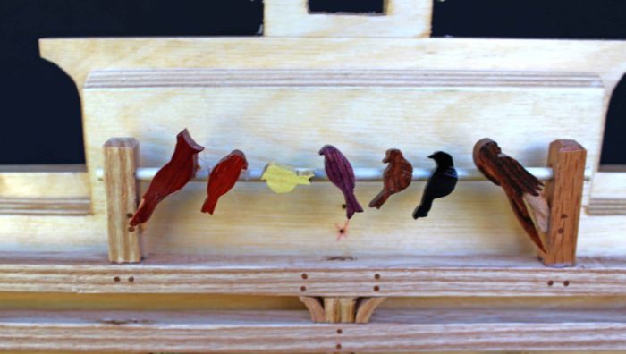 Birds roost in the top interior of the Ark. A matching section is on the other side