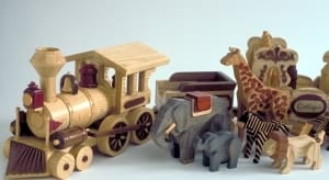 Assorted hardwoods add to the fun look of the train and animals