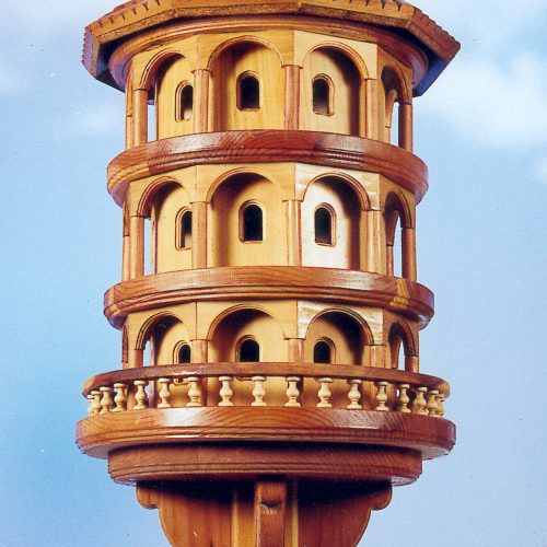 Three levels of homes like Purple Martin bird houses
