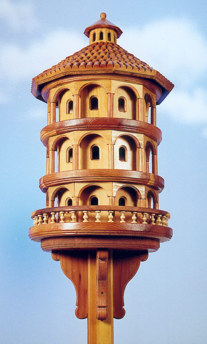 Three levels of homes like Purple Martin bird houses