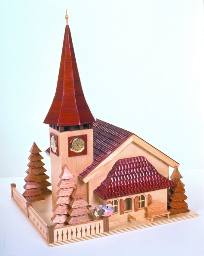 Small clocks can be installed in the wood Swiss church birdhouse tower