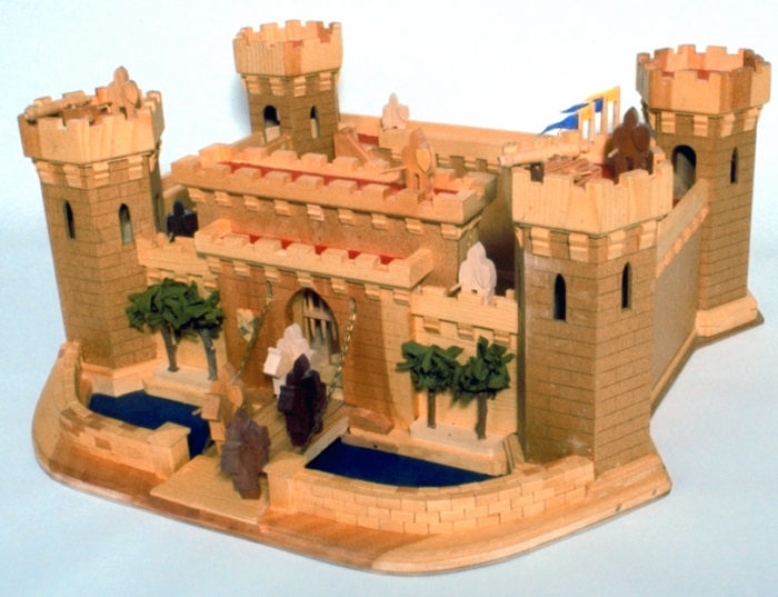 The drawbridge works and a grate lowers at the entrance. A great woodworking project