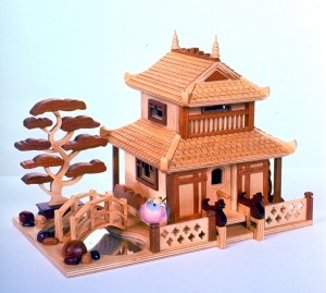 Fine detail cover the Pagoda Birdhouse including oriental features like the dragons at the doorway