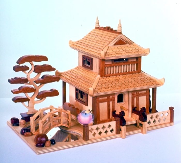 Fine detail cover the Pagoda Birdhouse including oriental features like the dragons at the doorway