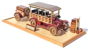 Antique Ford car with trailer